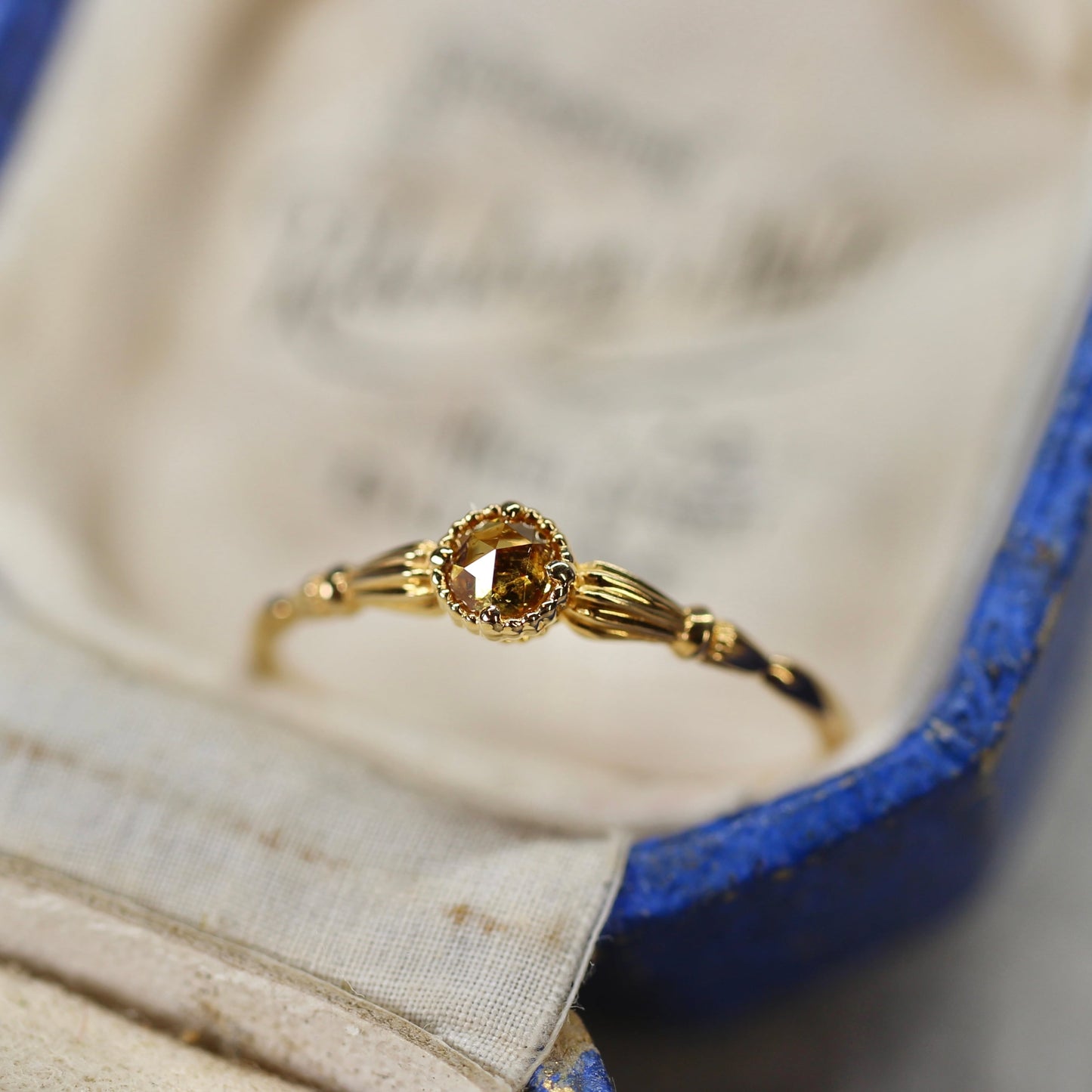 ローズカットブラウンダイヤモンド0.1ct K10YG ミルフレーム×アンティークアーム