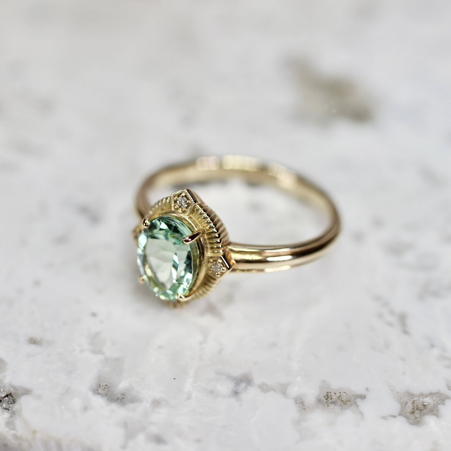 ミントブルートルマリン 1.16ct ダイヤモンド 0.02ct K10YG コンケーブカット トゥルース×グルーヴアーム