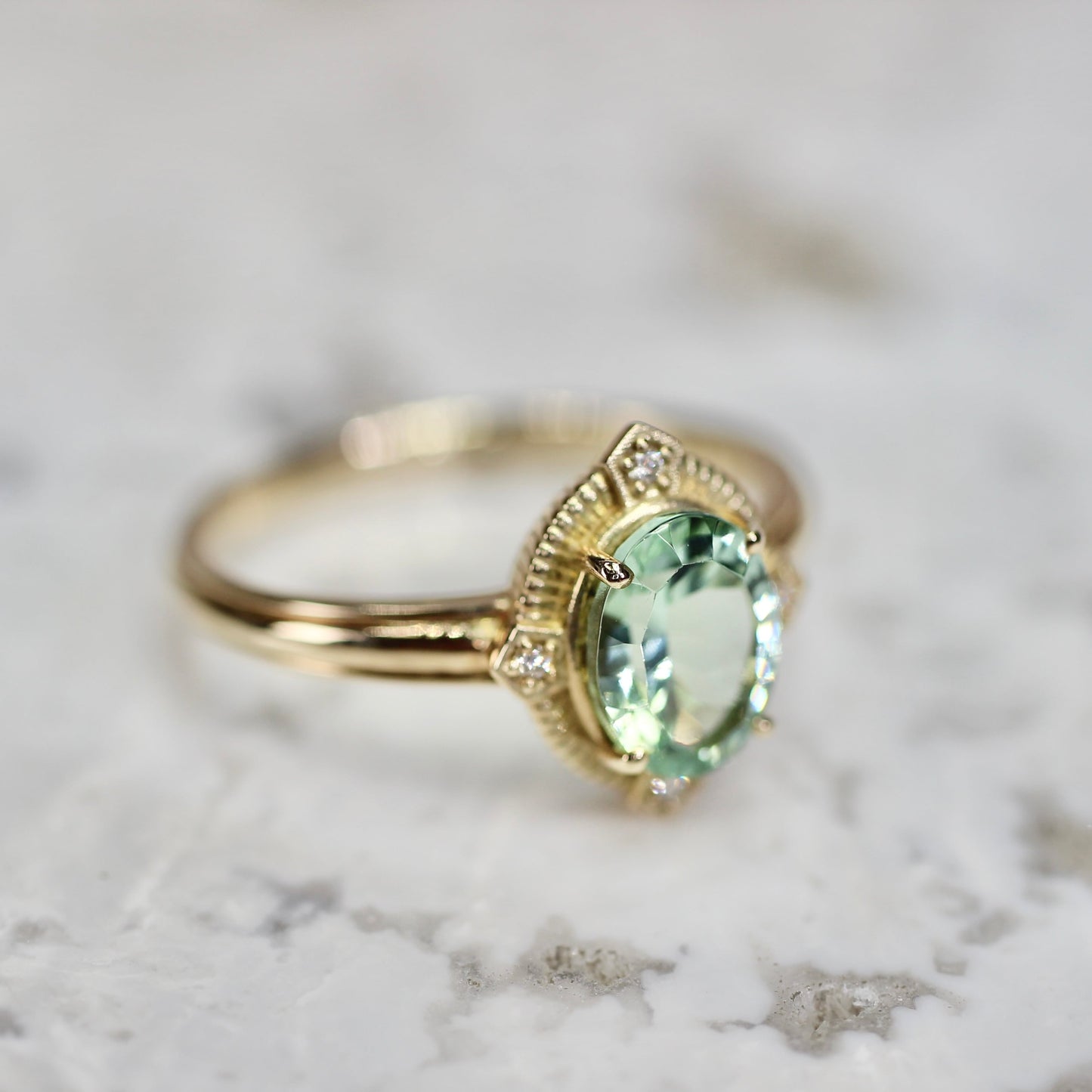 ミントブルートルマリン 1.16ct ダイヤモンド 0.02ct K10YG コンケーブカット トゥルース×グルーヴアーム