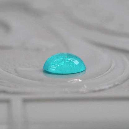 パライバトルマリン ブラジル産 0.19ct オーバルカボションカット 4.2mm×3.1mm×1.7mm【MJ3075】