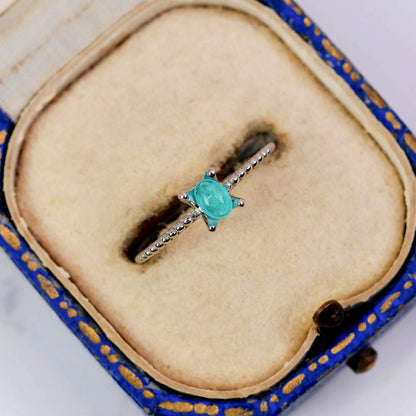 パライバトルマリン ブラジル産 0.19ct オーバルカボションカット 4.2mm×3.1mm×1.7mm【MJ3075】