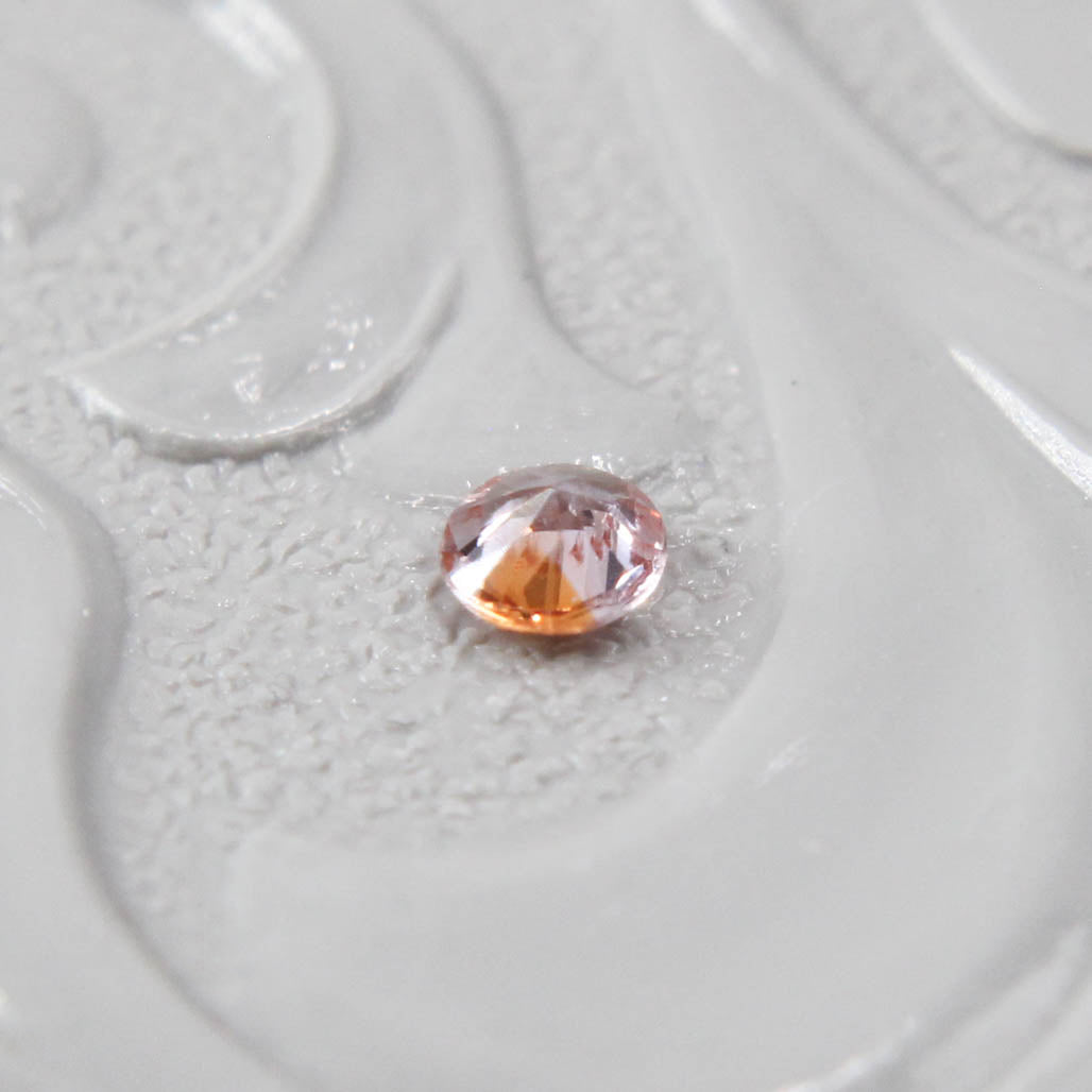バイカラーサファイア 0.08ct ラウンドカット 2.5mm×2.5mm×1.4mm【MJ2989】