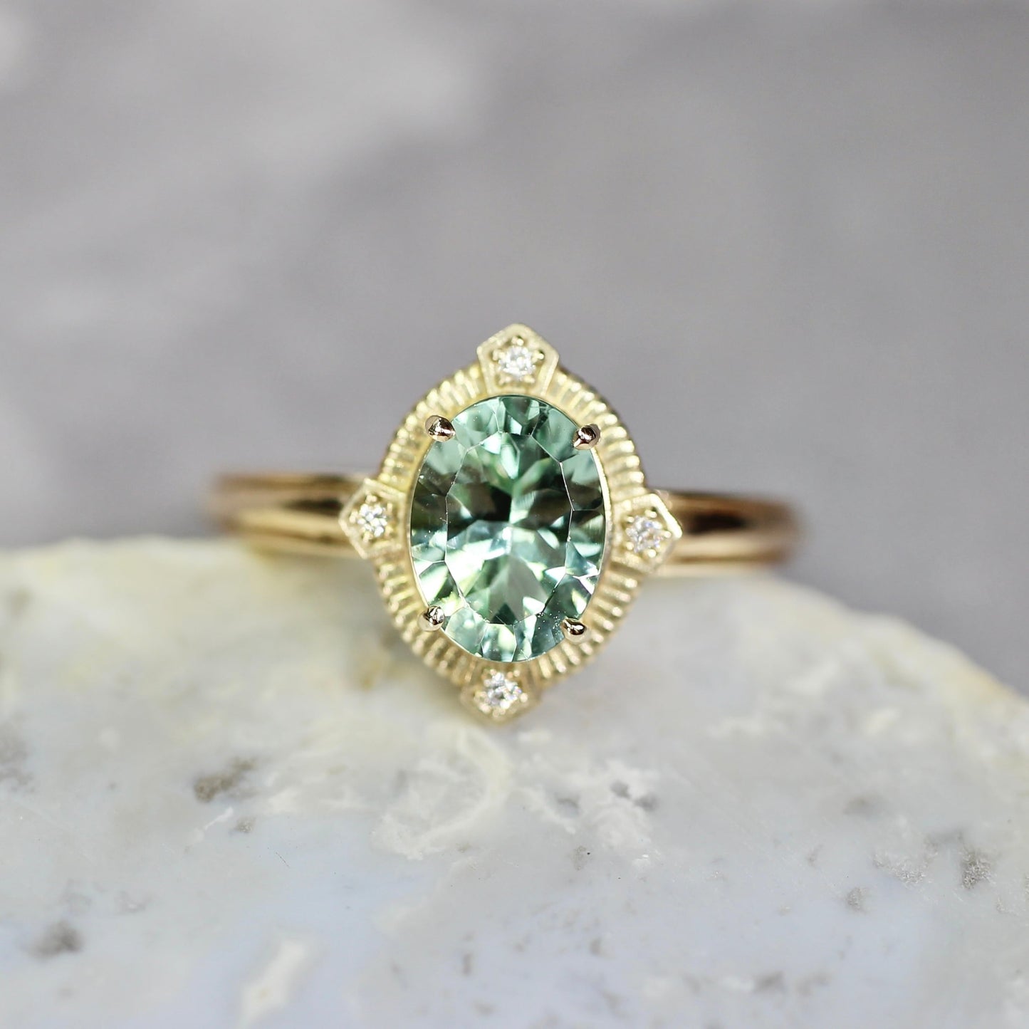 ミントブルートルマリン 1.16ct ダイヤモンド 0.02ct K10YG コンケーブカット トゥルース×グルーヴアーム