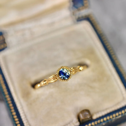 ラウンドカット バイカラーサファイア 0.19ct  3.1mm×3.1mm×1.7mm【MJ2541】