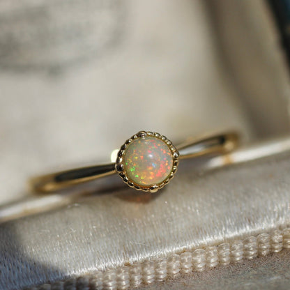 オパール 0.17ct K18YG ミルフレーム×絞りアーム リング 【MJ2402】