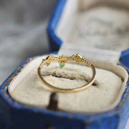 パライバトルマリン0.04ct/0.10ct K18YG レスピレーションリング 【MJ2457】