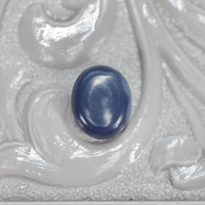 ブラックオパール 0.58ct オーバルカボションカット 6.2mm×5.1mm×2.9mm【MJ2647】