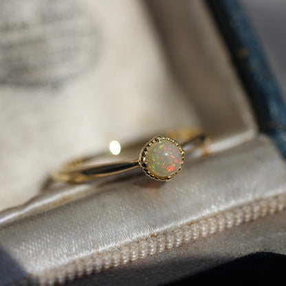 オパール 0.17ct K18YG ミルフレーム×絞りアーム リング 【MJ2402】