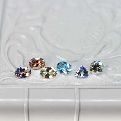 ラウンドカット バイカラーゾイサイト 0.53ct  5.0mm×5.0mm×3.3mm 【MJ2526】