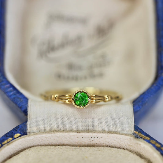 デマントイドガーネット 0.145ct ラウンドブリリアントカット K10YG ミルフレーム×アンティークアーム【MJ2846】