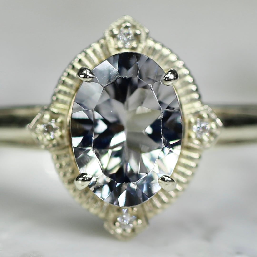 グレイッシュブルートルマリン 1.23ct ダイヤモンド 0.02ct K10WG コンケーブカット トゥルース×グルーヴアーム