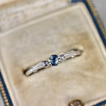 ラウンドカット バイカラーサファイア 0.19ct  3.1mm×3.1mm×1.7mm【MJ2541】