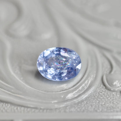 イリデッセンスサファイア 0.85ct オーバルカット 6.4mm×5.0mm×2.9mm【MJ3062】