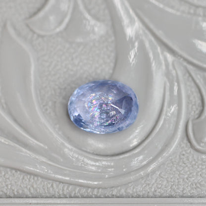 イリデッセンスサファイア 0.85ct オーバルカット 6.4mm×5.0mm×2.9mm【MJ3062】