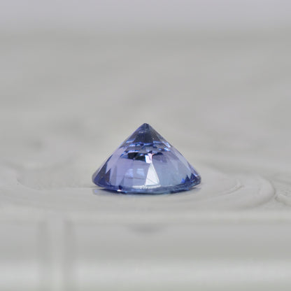 バイカラーゾイサイト 0.72ct ラウンドカット  5.9mm×5.8mm×3.5mm【MJ2901】