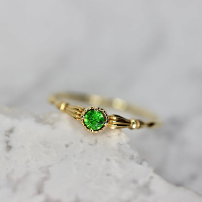 デマントイドガーネット 0.145ct ラウンドブリリアントカット K10YG ミルフレーム×アンティークアーム【MJ2846】