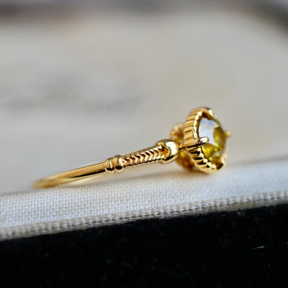 スフェーン0.56ct K18YG ミルフレーム×ヘリンボーンアーム リング 【MJ2405】