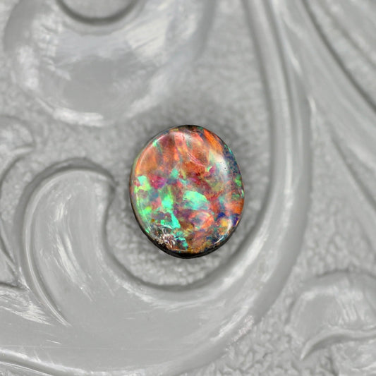 ボルダーオパール 0.38ct オーバルカボションカット 5.2mm×4.6mm×2.0mm【MJ2648】