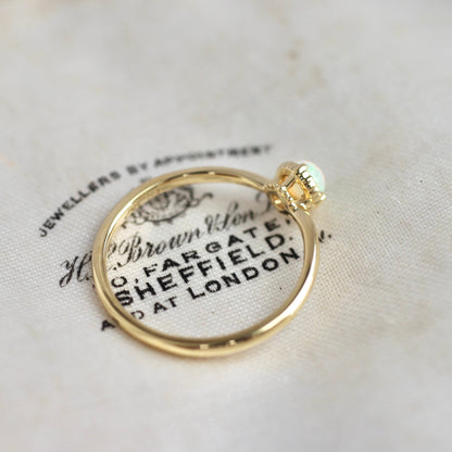 オパール 0.17ct K18YG ミルフレーム×絞りアーム リング 【MJ2402】