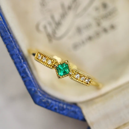 エメラルド 0.07ct ダイヤモンド 計0.03ct プリンセスカット K18YG ミルフレーム×シグナルアーム【MJ2848】