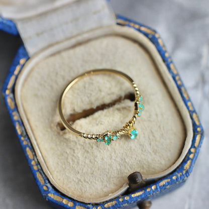 パライバトルマリン0.04ct/0.10ct K18YG レスピレーションリング 【MJ2457】