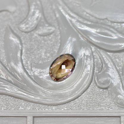 オーバルカット バイカラーゾイサイト 0.52ct  5.6mm×3.7mm×2.6mm 【MJ2530】