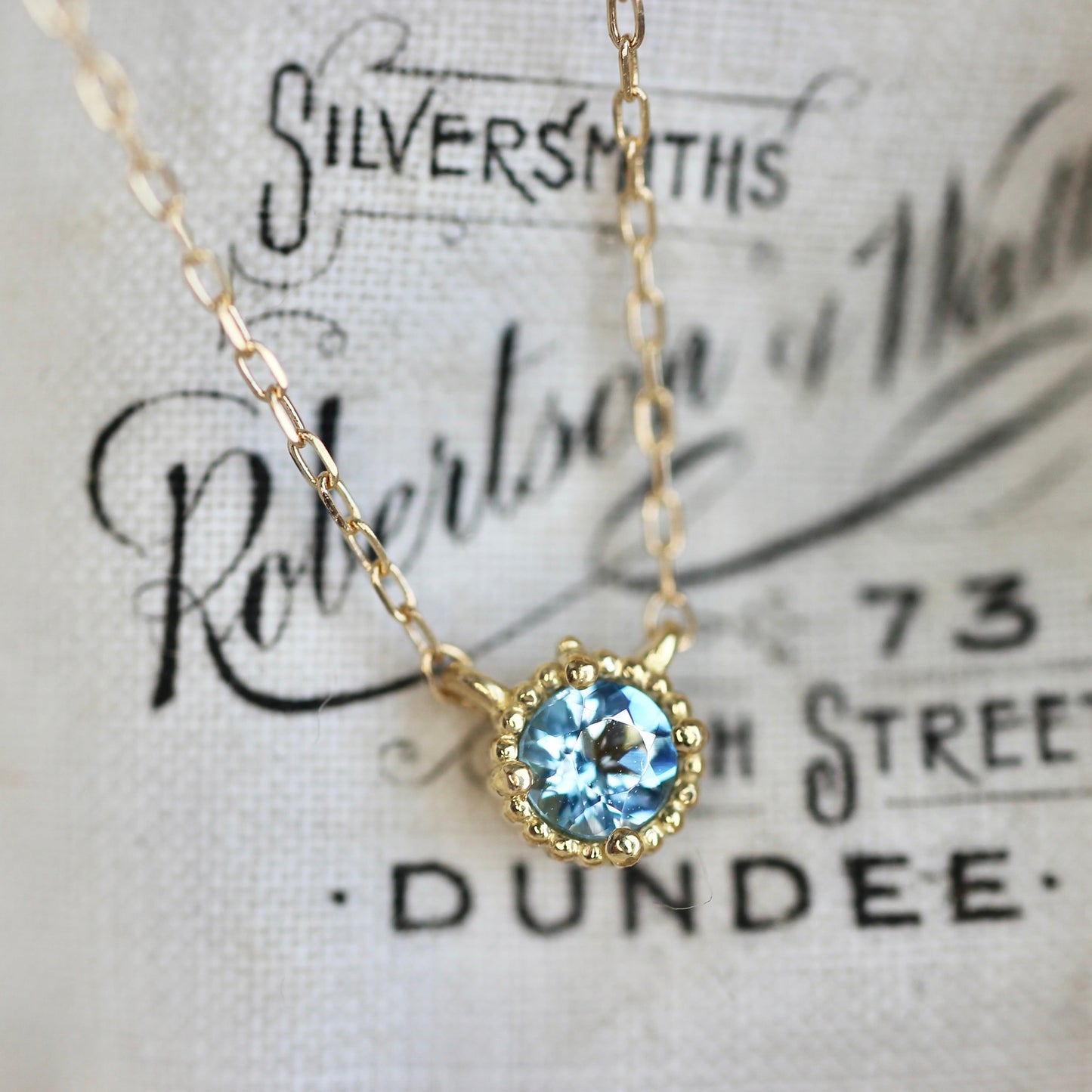 サンタマリアアクアマリン0.1ct 3mm K18YG ミルフレーム ネックレス 【MJ2447】