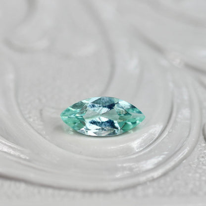 パライバカラーベリル 0.19ct マーキスカット 6.4mm×3.0mm×2.2mm【MJ2712】