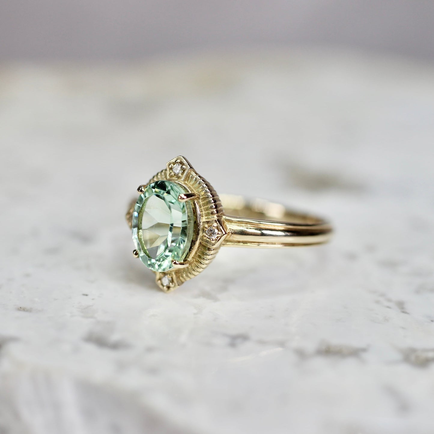 ミントブルートルマリン 1.16ct ダイヤモンド 0.02ct K10YG コンケーブカット トゥルース×グルーヴアーム